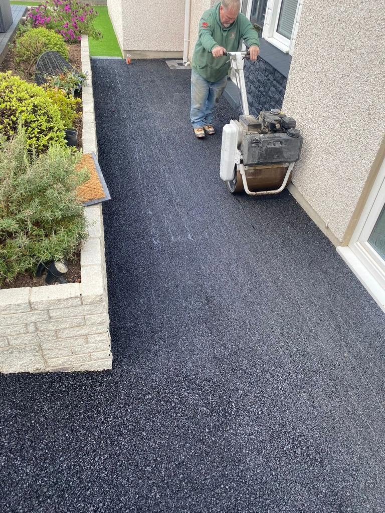 Tarmac driveway being compacted by EBP in North Wales