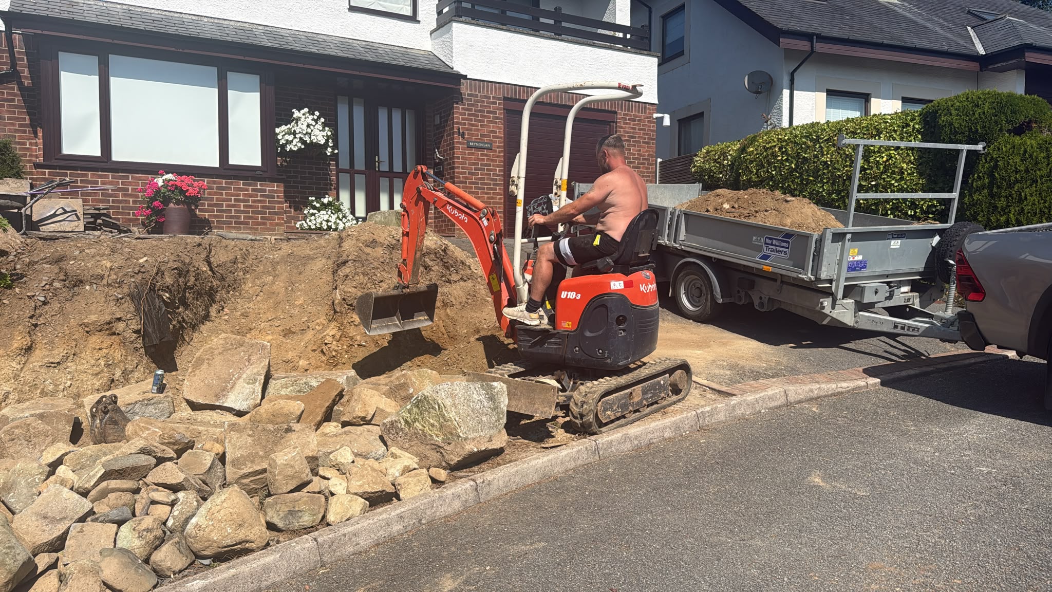 Ground excavation during Criccieth stone walling project