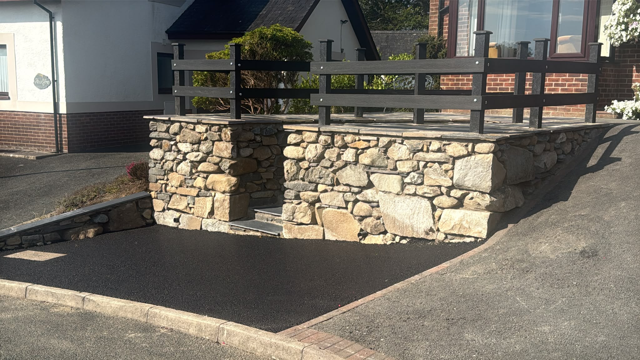 Completed stone retaining walls and steps in Criccieth