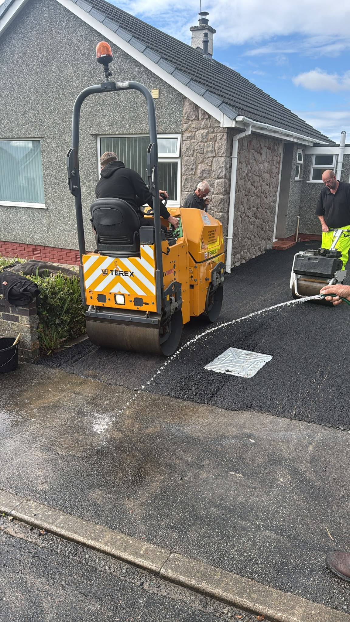 Tarmac driveway being rolled in Abersoch